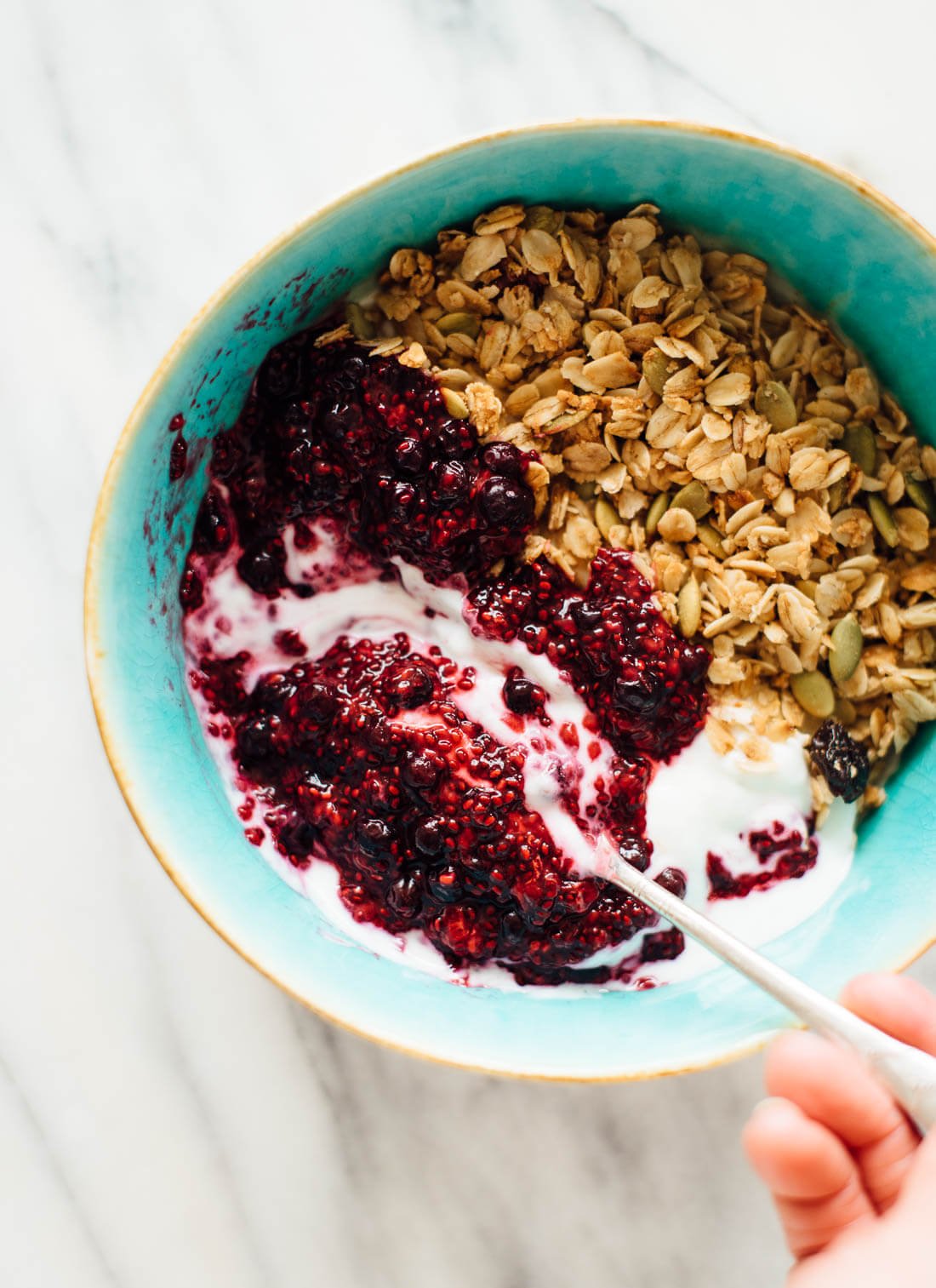 Super simple berry chia jam recipe goes great with yogurt and granola!