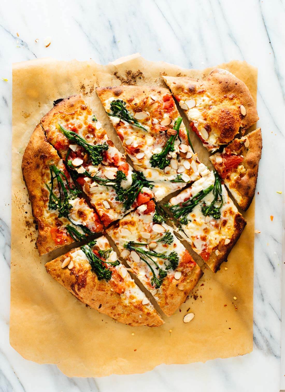 Amazing homemade broccolini pizza! It's my new favorite veggie pizza. Get the recipe at cookieandkate.com