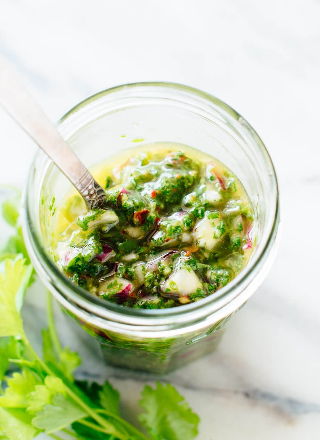 You'll love this traditional chimichurri recipe! Chimichurri is a popular parsley sauce recipe in Argentina with a super bold, fresh flavor. cookieandkate.com