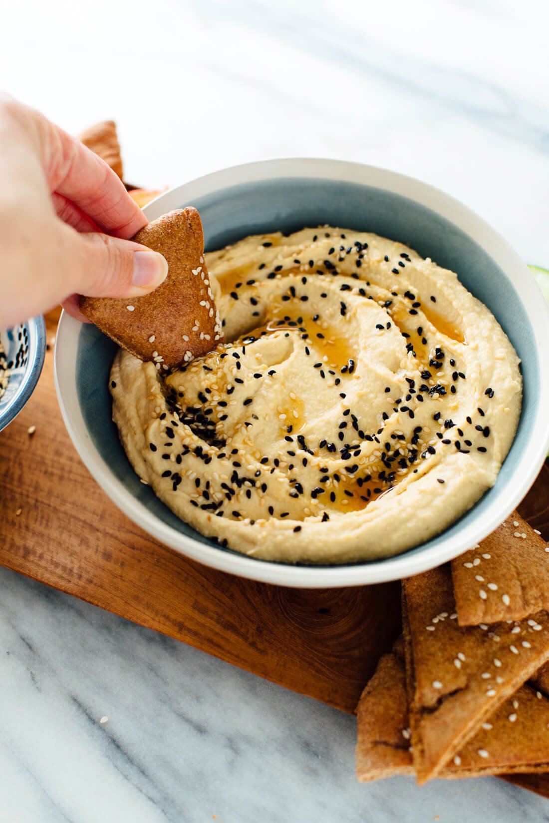 This creamy hummus recipe is made with extra sesame! Toasted sesame oil and sesame seeds, in addition to tahini, makes this dip irresistible.