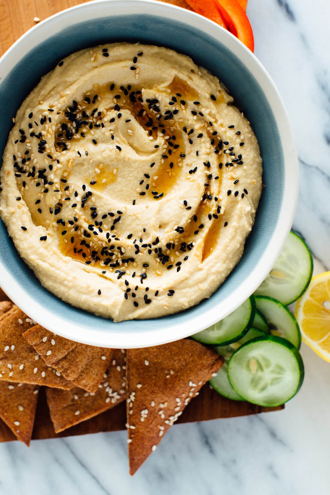 This toasted sesame hummus recipe includes toasted sesame oil and toasted sesame seeds on top! You're going to love it.