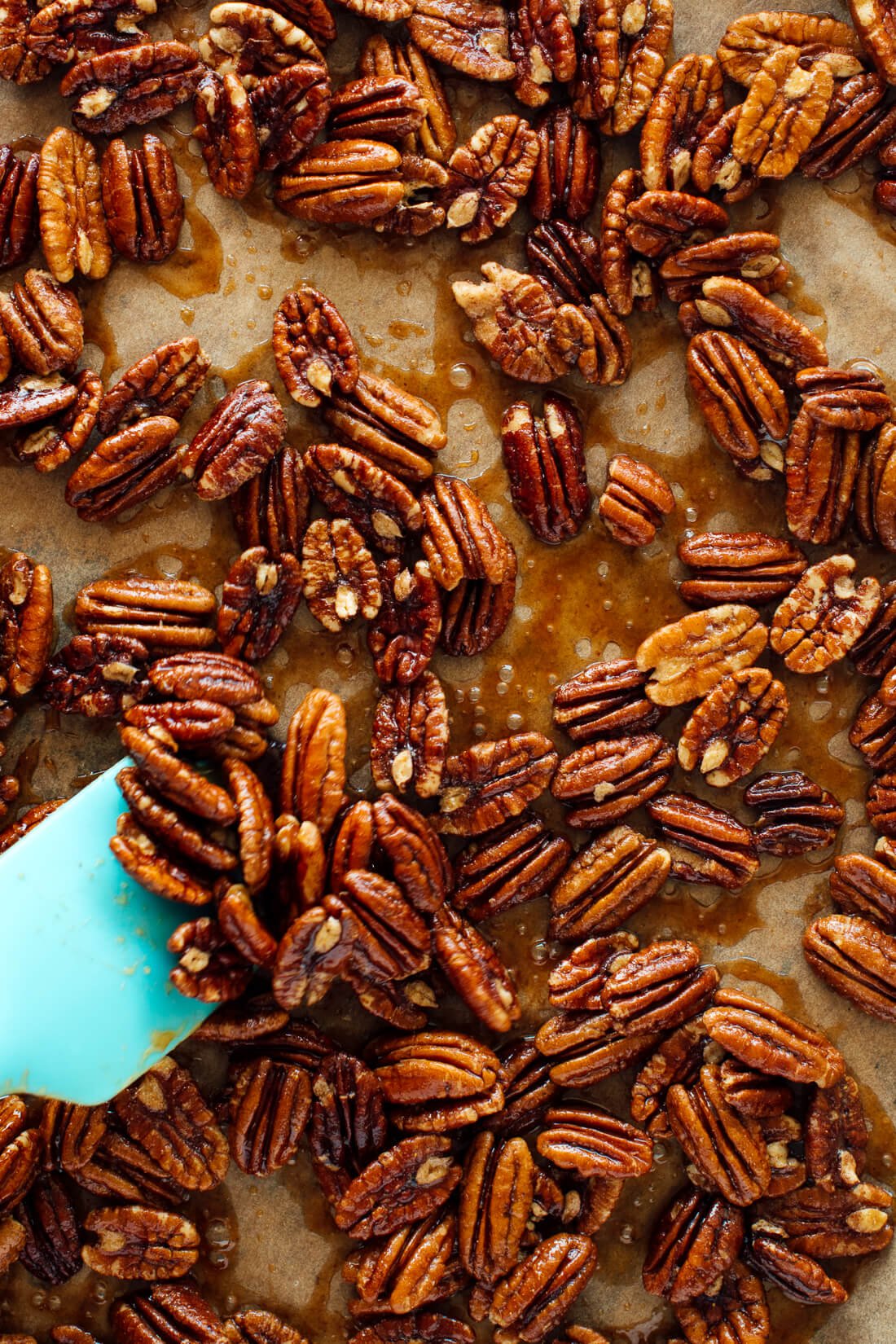 stirring maple candied pecans
